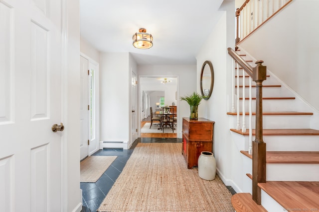 290 Fillow St, Norwalk, CT 06850 - entrance foyer featuring baseboard heating, stairway, healthy amount of natural light, and tile patterned floors