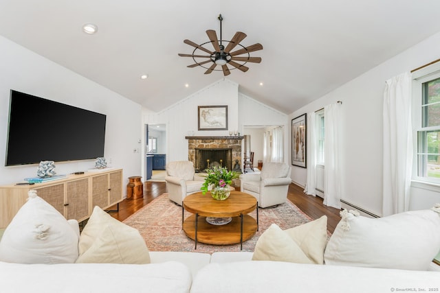 290 Fillow St, Norwalk, CT 06850 - living room with ceiling fan, a fireplace, vaulted ceiling, wood finished floors, and baseboard heating