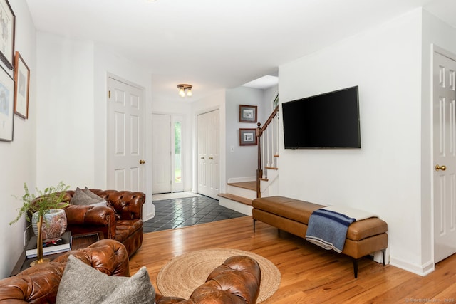 290 Fillow St, Norwalk, CT 06850 - living room with stairs, wood finished floors, and baseboards