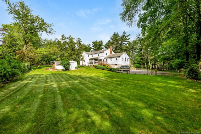 290 Fillow St, Norwalk, CT 06850 - view of grassy yard featuring a deck