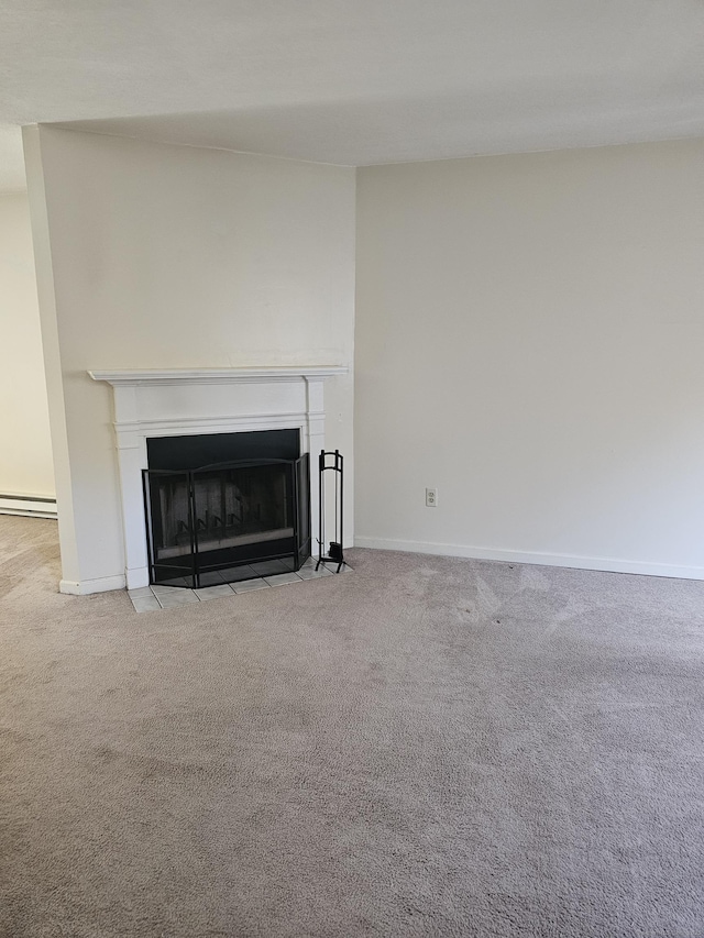 925 Oronoke Rd Unit 17F, Waterbury, CT 06708 - detailed view of a fireplace with flush hearth, carpet, and a baseboard heating unit