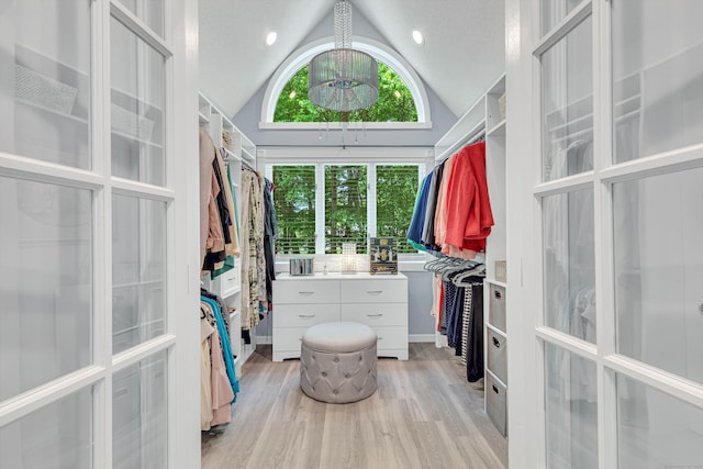 48 Shepherds Trl, Madison, CT 06443 - walk in closet with light wood-style flooring, lofted ceiling, and french doors