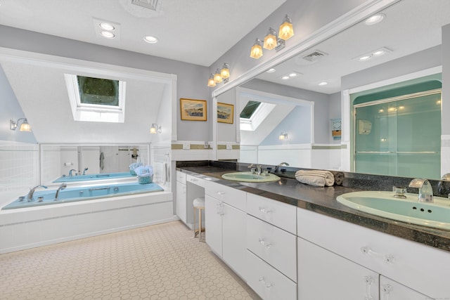 48 Shepherds Trl, Madison, CT 06443 - full bath with a skylight, double vanity, a shower stall, and a bath