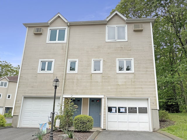 245 E Woodland St Apt 14, Meriden, CT 06451 - view of front of home with asphalt driveway and an attached garage