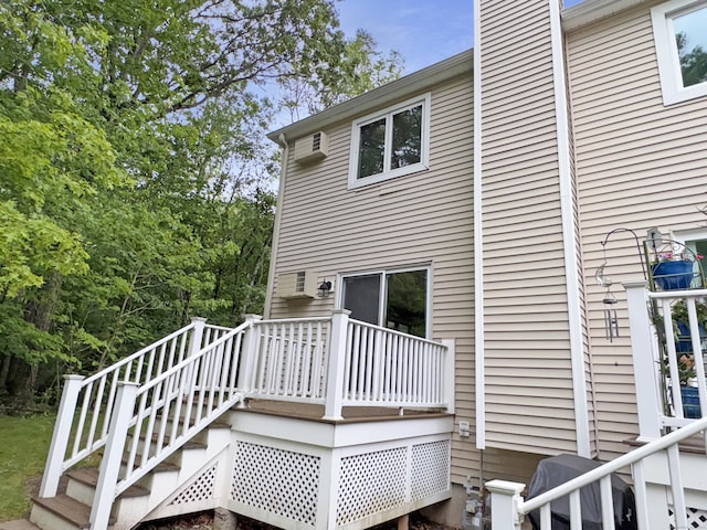 245 E Woodland St Apt 14, Meriden, CT 06451 - wooden terrace featuring stairway and a wall mounted AC