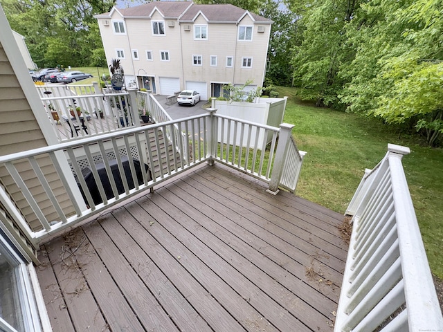 245 E Woodland St Apt 14, Meriden, CT 06451 - deck featuring a yard and view of wooded area