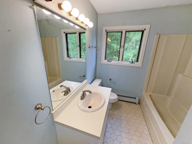 245 E Woodland St Apt 14, Meriden, CT 06451 - full bath featuring baseboard heating, toilet, vanity, tile patterned floors, and shower / tub combination