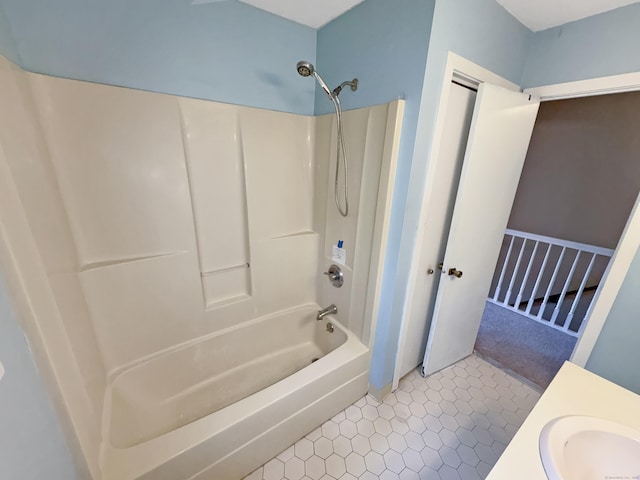 245 E Woodland St Apt 14, Meriden, CT 06451 - bathroom with shower / tub combination, tile patterned flooring, and vanity