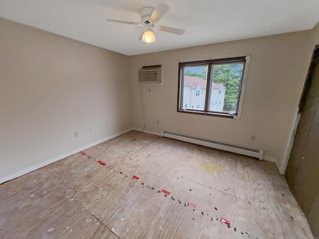 245 E Woodland St Apt 14, Meriden, CT 06451 - spare room with a baseboard heating unit, a ceiling fan, a wall mounted air conditioner, baseboards, and light wood finished floors