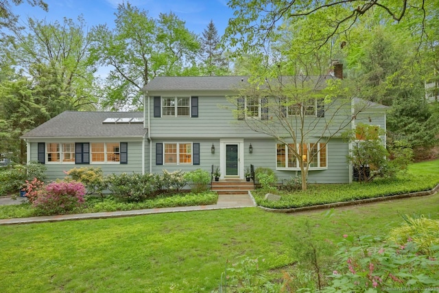 32 Jeffrey Rd, Greenwich, CT 06830 - colonial home with a chimney and a front yard