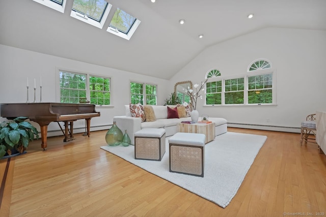 32 Jeffrey Rd, Greenwich, CT 06830 - living area with a baseboard heating unit, a skylight, wood finished floors, recessed lighting, and high vaulted ceiling