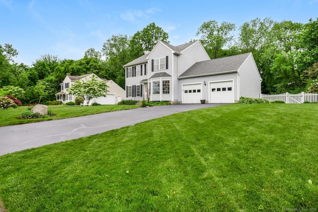 125 Longview Dr, Stratford, CT 06614 - view of front of home with driveway, a garage, and roof with shingles