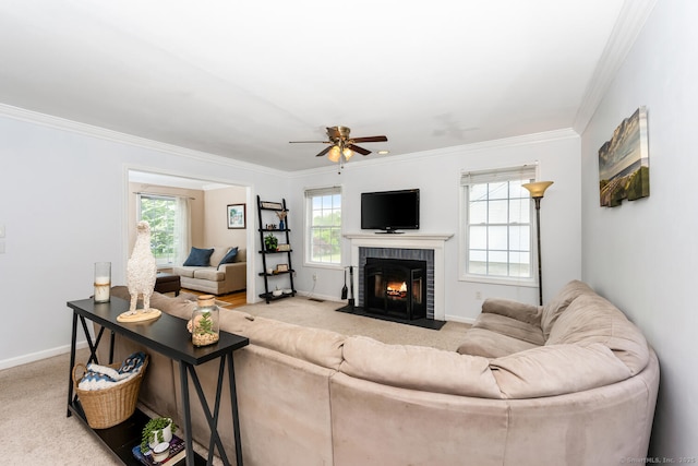 125 Longview Dr, Stratford, CT 06614 - living area with carpet, ceiling fan, ornamental molding, baseboards, and a fireplace