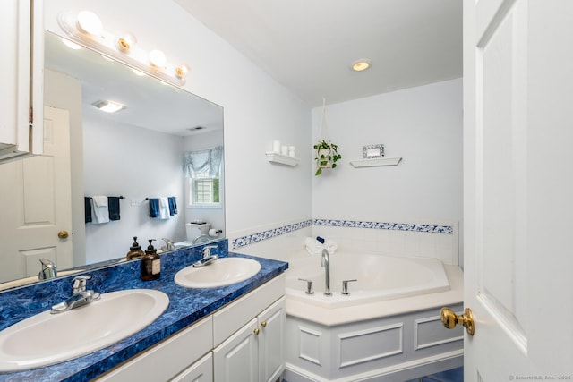 125 Longview Dr, Stratford, CT 06614 - full bath with double vanity and a garden tub