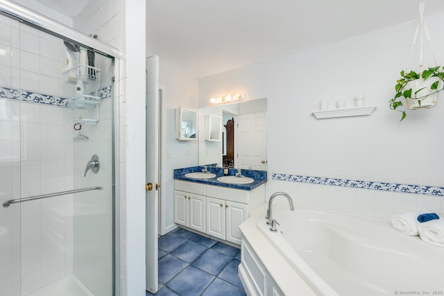 125 Longview Dr, Stratford, CT 06614 - bathroom with a shower stall, double vanity, a bath, and tile patterned floors
