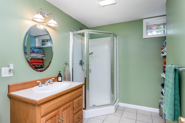 125 Longview Dr, Stratford, CT 06614 - full bathroom with vanity, a shower stall, tile patterned floors, and baseboards