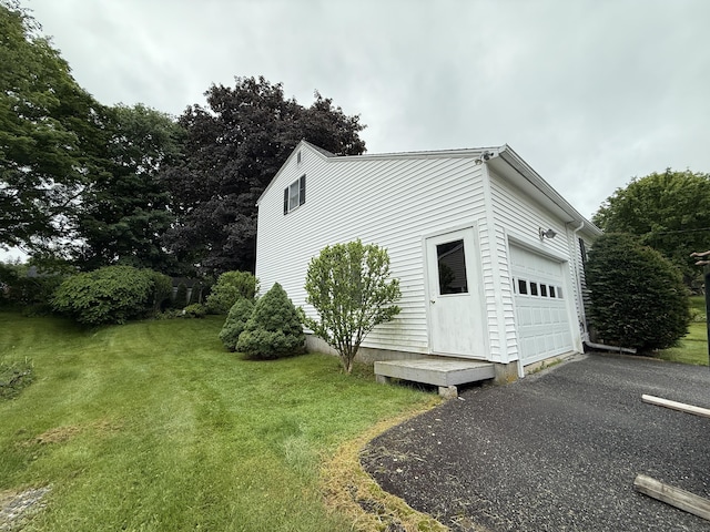 284 Gilbert Ave, Winchester, CT 06098 - view of home's exterior featuring a lawn and asphalt driveway