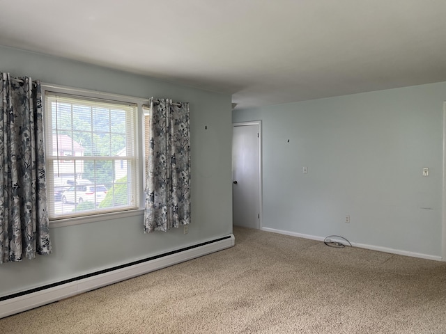 284 Gilbert Ave, Winchester, CT 06098 - empty room with a baseboard heating unit, carpet floors, and baseboards