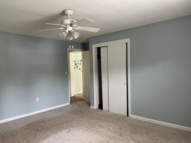 284 Gilbert Ave, Winchester, CT 06098 - unfurnished bedroom with carpet, a closet, baseboards, and a ceiling fan