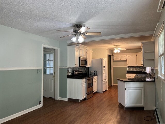 284 Gilbert Ave, Winchester, CT 06098 - kitchen featuring stainless steel appliances, ceiling fan, dark countertops, baseboard heating, and backsplash