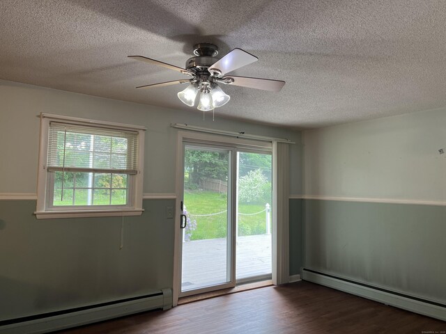 284 Gilbert Ave, Winchester, CT 06098 - entryway featuring a baseboard heating unit, a baseboard radiator, a textured ceiling, wood finished floors, and ceiling fan