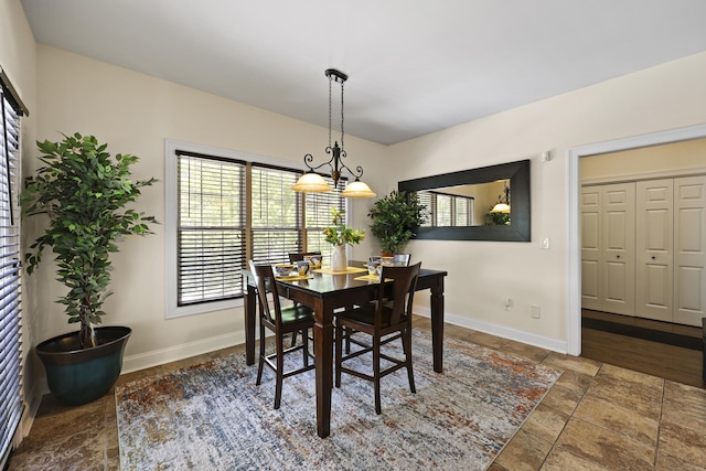 81 Aresco Dr, Middletown, CT 06457 - dining room featuring baseboards and stone finish flooring