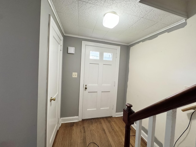 87 Munson Rd, Beacon Falls, CT 06403 - foyer featuring wood finished floors, baseboards, crown molding, and stairs
