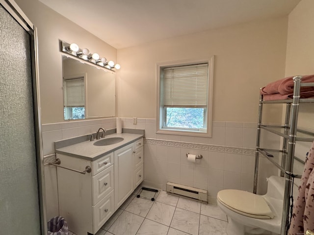 87 Munson Rd, Beacon Falls, CT 06403 - full bath featuring baseboard heating, tile walls, toilet, vanity, and a wainscoted wall