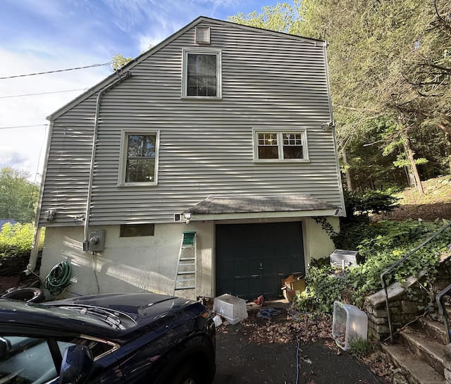87 Munson Rd, Beacon Falls, CT 06403 - view of property exterior with a garage