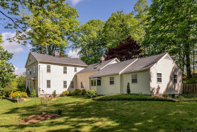 8 Southbury Rd, Roxbury, CT 06783 - back of property featuring a chimney, a lawn, and roof with shingles