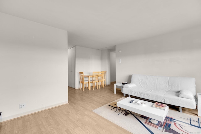 2625 Park Ave Unit 7R, Bridgeport, CT 06604 - living room featuring light wood-style flooring and baseboards