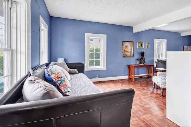 16 Hodge Ave, Ansonia, CT 06401 - living area featuring a textured ceiling and baseboards