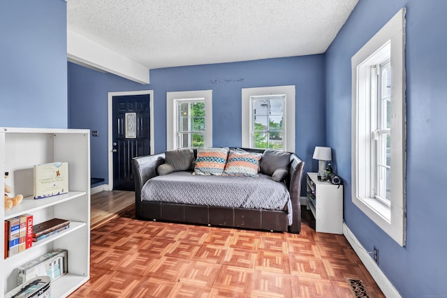16 Hodge Ave, Ansonia, CT 06401 - bedroom with a textured ceiling and baseboards