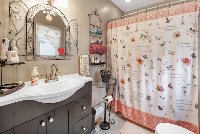 16 Hodge Ave, Ansonia, CT 06401 - bathroom featuring vanity, toilet, a shower with shower curtain, and tile patterned flooring