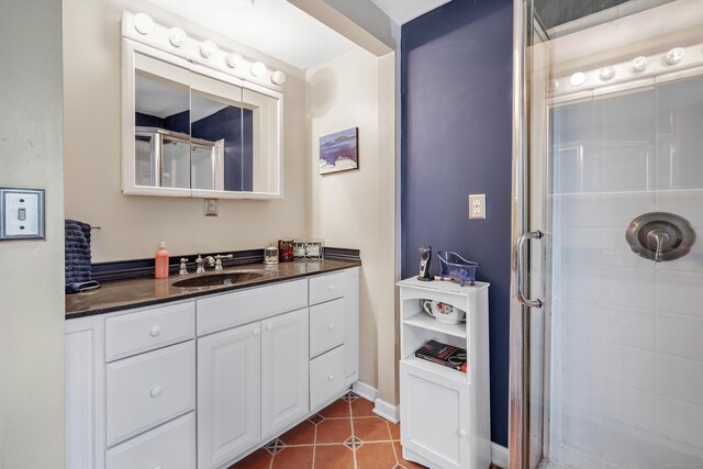 16 Hodge Ave, Ansonia, CT 06401 - full bathroom with a stall shower, vanity, and tile patterned floors