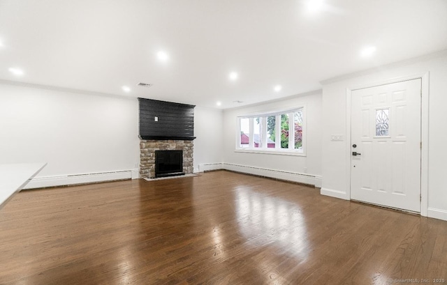 24 Linde St, West Haven, CT 06516 - unfurnished living room with a baseboard radiator, wood finished floors, a stone fireplace, recessed lighting, and crown molding