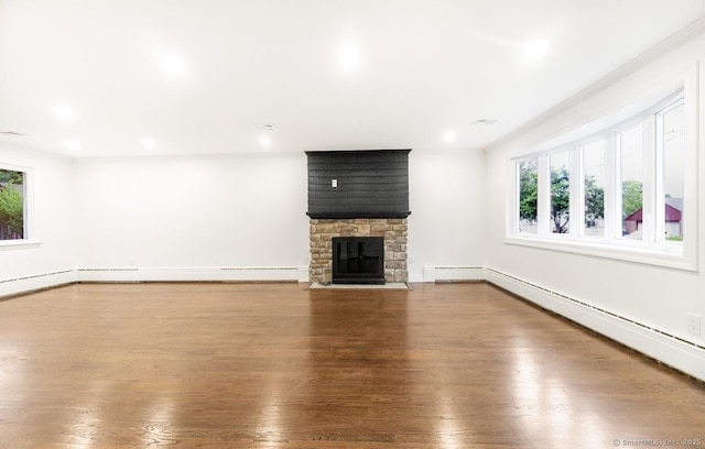 24 Linde St, West Haven, CT 06516 - unfurnished living room featuring healthy amount of natural light, wood finished floors, a baseboard radiator, and recessed lighting