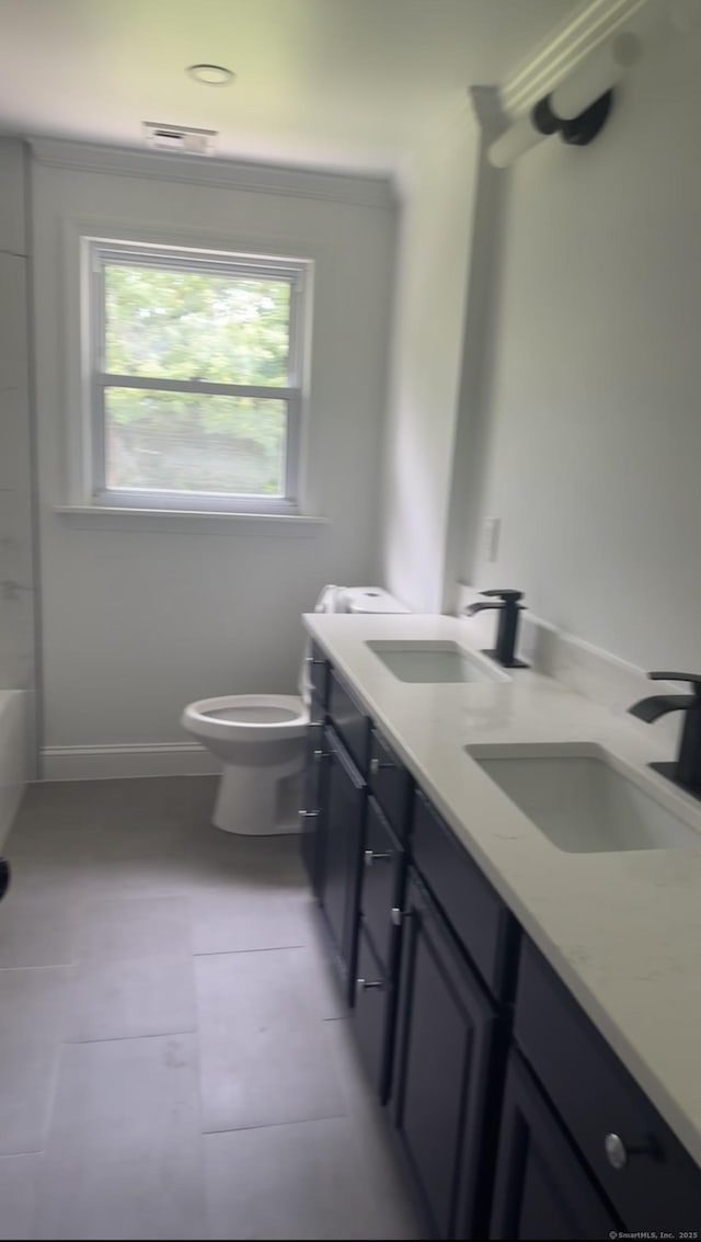 24 Linde St, West Haven, CT 06516 - full bath with toilet, double vanity, and baseboards