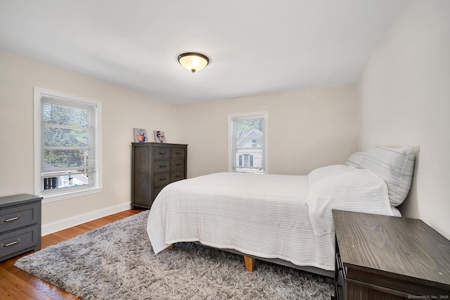 35 Deer Hill Ave, Danbury, CT 06810 - bedroom featuring multiple windows, light wood-style floors, and baseboards