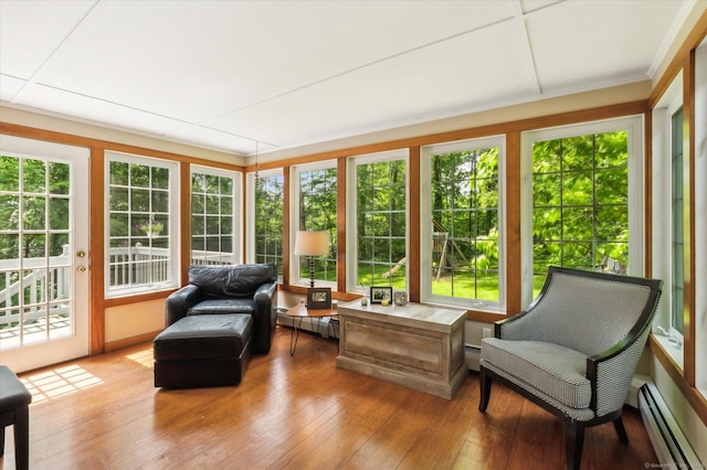 8 Buttonwood Dr, Simsbury, CT 06070 - sunroom / solarium featuring a baseboard radiator, hardwood / wood-style floors, french doors, and ornamental molding