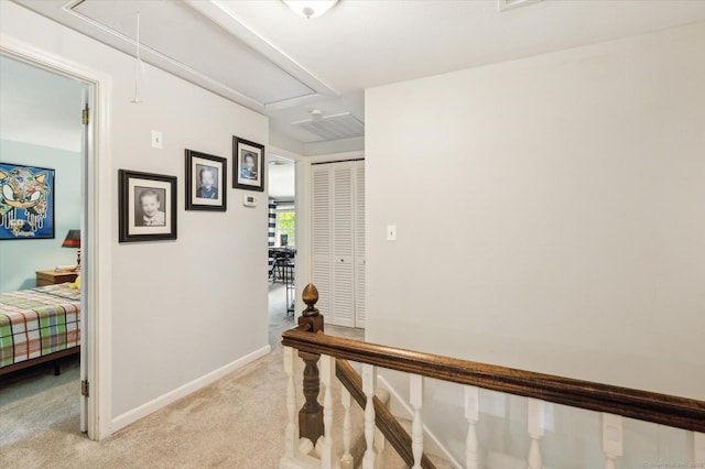 8 Buttonwood Dr, Simsbury, CT 06070 - hallway featuring attic access and light carpet