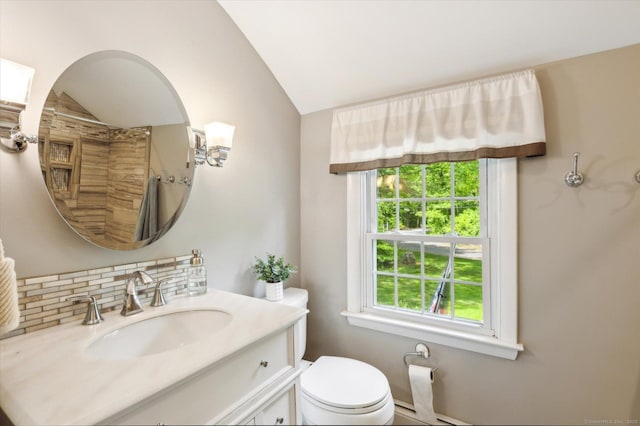 8 Buttonwood Dr, Simsbury, CT 06070 - bathroom with lofted ceiling, vanity, and tasteful backsplash