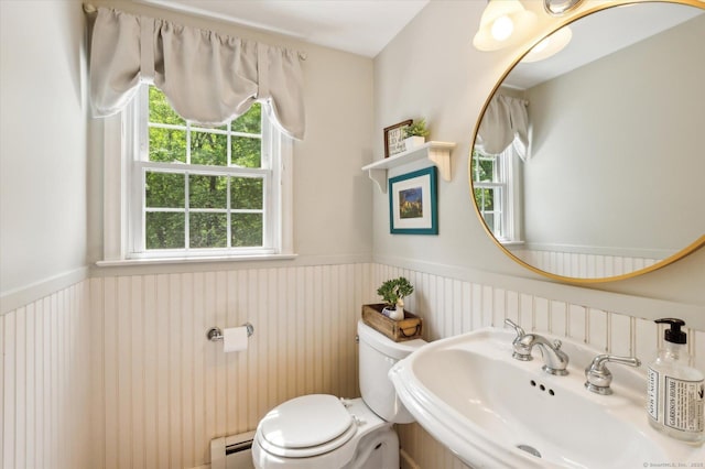 8 Buttonwood Dr, Simsbury, CT 06070 - bathroom with a baseboard heating unit and wainscoting