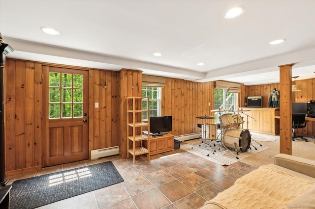 8 Buttonwood Dr, Simsbury, CT 06070 - entrance foyer featuring a baseboard radiator, wood walls, and recessed lighting