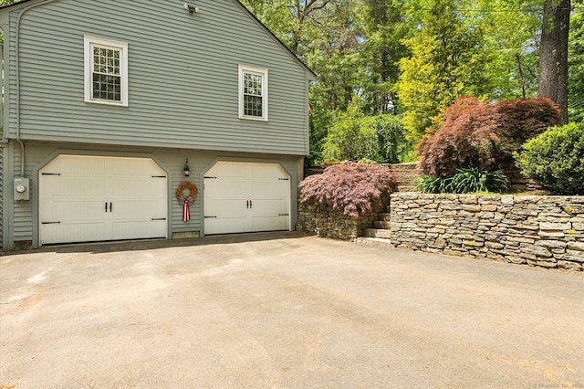 8 Buttonwood Dr, Simsbury, CT 06070 - garage with driveway