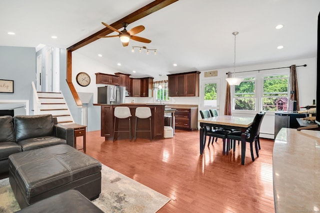 8 High Meadow Ln, Enfield, CT 06082 - living area featuring healthy amount of natural light, a ceiling fan, light wood-type flooring, stairs, and recessed lighting