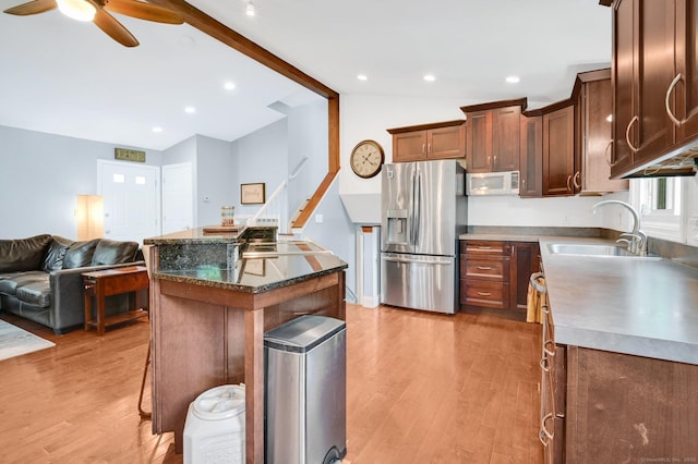 8 High Meadow Ln, Enfield, CT 06082 - kitchen with stainless steel fridge with ice dispenser, a sink, light wood-type flooring, ceiling fan, and open floor plan