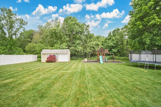 8 High Meadow Ln, Enfield, CT 06082 - view of yard featuring a trampoline, a playground, and a detached garage