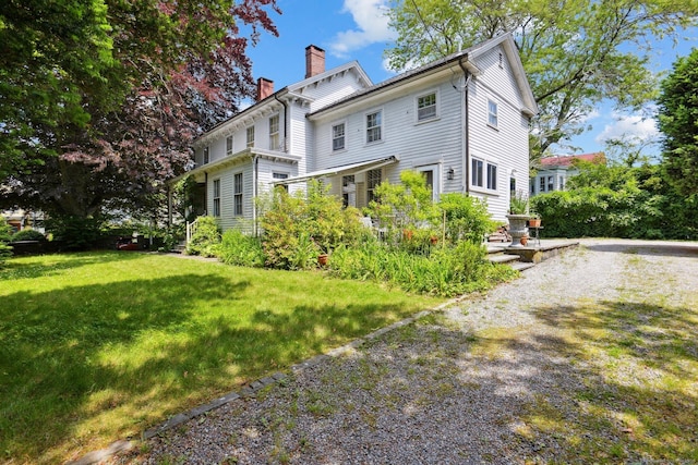 2 Summit St, Stonington, CT 06378 - back of property with a chimney and a lawn