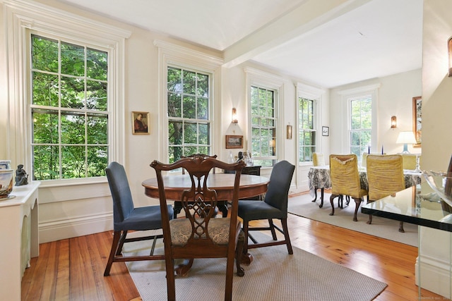 2 Summit St, Stonington, CT 06378 - dining area featuring light wood-style floors, plenty of natural light, and beam ceiling